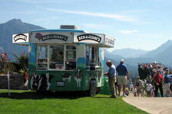photo of cowmobile set up for ice cream vending at a special event